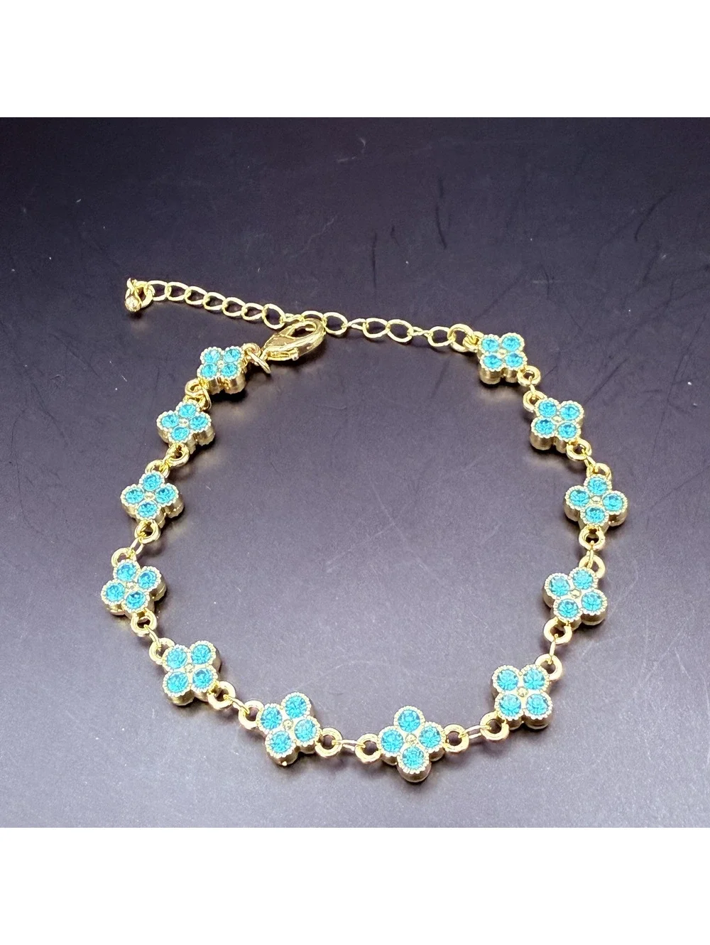 candy+clover aqua crystal clover gold tone bracelet